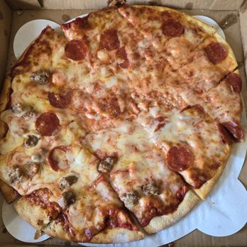 Gino's Pizza - 16" half sausage, half pepperoni pizza. Looked very messy. - Pizza Near Me - Hartford, Wisconsin Gino's Pizza - 16" half sausage, half pepperoni pizza. Looked very messy. - Pizza Near Me - Hartford, Wisconsin