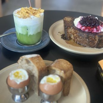 Façade Bakery - Corn Flake Matcha, Egg Soldiers, Sough dough French Toast with Blueberry compote - Bakeries Near Me - Coral Gables, Florida