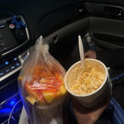 Papaya and mango with chamoy. Elotes.