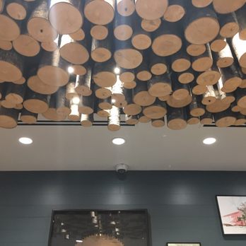 SpringHill Suites by Marriott Bend - Cool wood installation over front reception desk - Hotels Near Me - Bend, Oregon SpringHill Suites by Marriott Bend - Cool wood installation over front reception desk - Hotels Near Me - Bend, Oregon