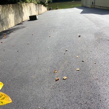AC Paving - Side of house - General Contractors Near Me