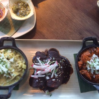 Frontera Grill - Mole Trio with mole poblano enchiladas, pork in yucatexan pipian &veggies in fresh green mole! - Mexican Near Me - Chicago, Illinois Frontera Grill - Mole Trio with mole poblano enchiladas, pork in yucatexan pipian &veggies in fresh green mole! - Mexican Near Me - Chicago, Illinois