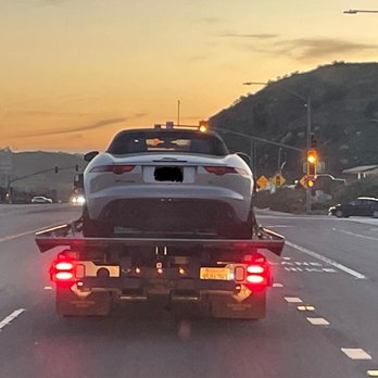 QUALITY TOWING - My poor Jag in the truck - Towing Near Me
