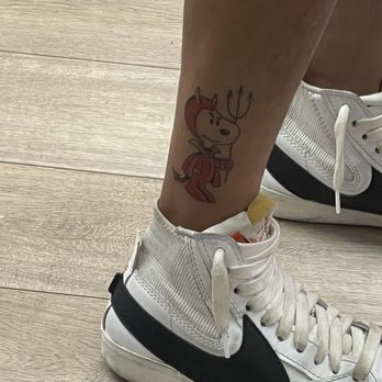 Firestone Tattoo - Friday the 13th Snoopy Devil tat - Tattoo Near Me - Downey, California Firestone Tattoo - Friday the 13th Snoopy Devil tat - Tattoo Near Me - Downey, California