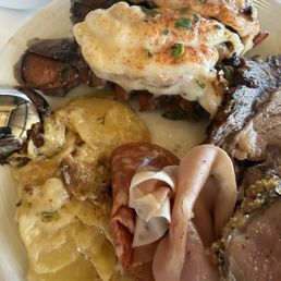 Lobster tail, scallop potatoes, prime beef, beef Wellington. Lobster tail, scallop potatoes, prime beef, beef Wellington.