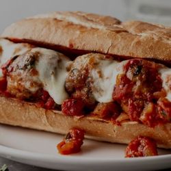 715 Bar & Grill - Meatball Sub: handmade pork, veil & beef.