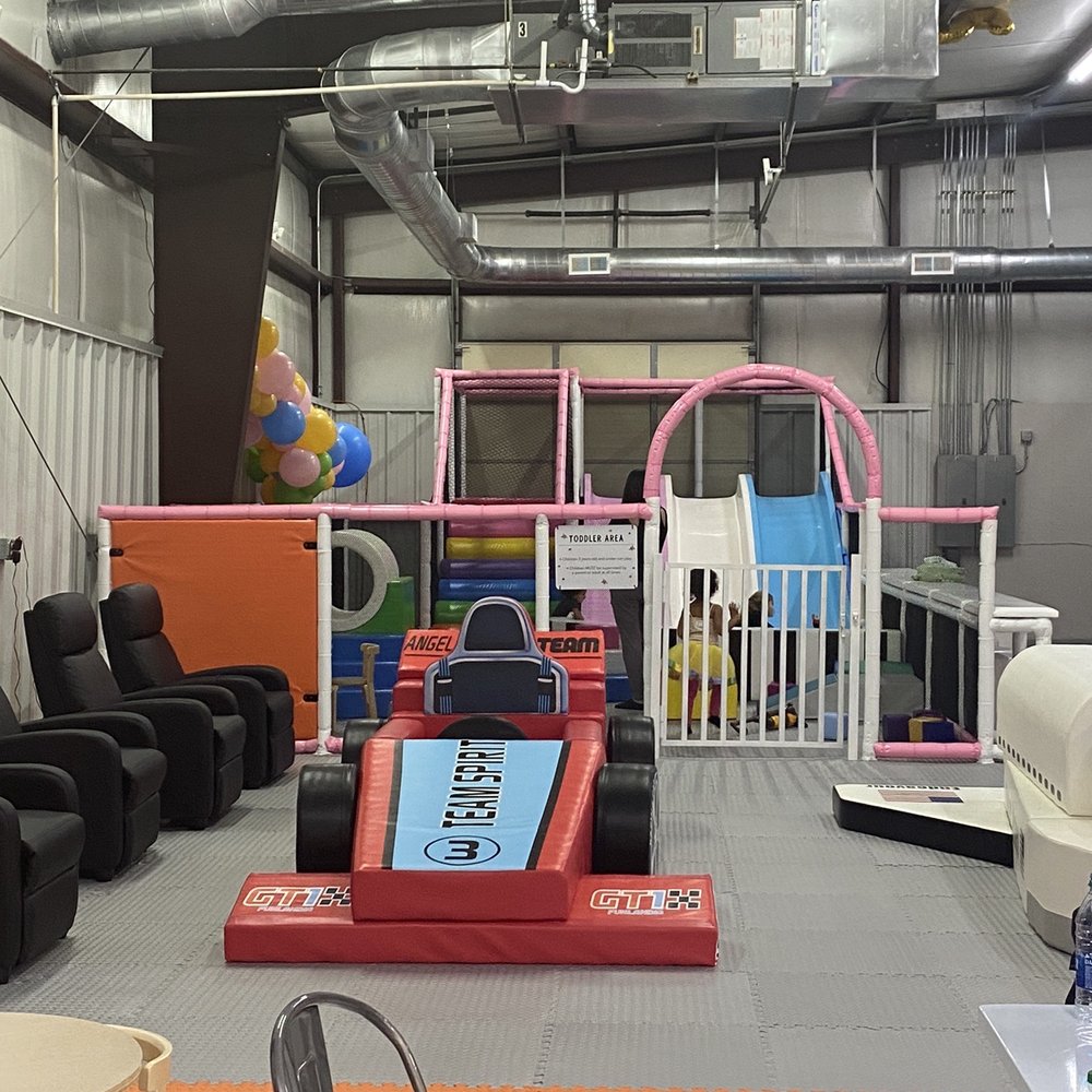 Playland Indoor Playground - Toddler zone and massage chairs for parents. - Indoor Playcenter Near Me - Monroe, North Carolina