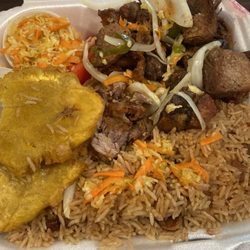 Mowry's Restaurant - Griot complete! Fried pork, rice and peas, green plantain and pickliz!