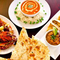 Curry Time - The food they serve  Chicken tikka masala tandoori chicken garlic naan and rice