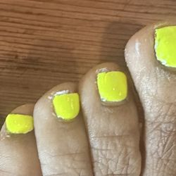 Nailed It Spa - This is the picture with the half a toenail on it and still bad polished job