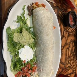 Vallartas Mexican Grill - Tequila Burrito.  Very large order.  Could be split.
