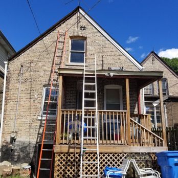Miranda's Remodeling - a house with a ladder - Flooring Near Me Miranda's Remodeling - a house with a ladder - Flooring Near Me