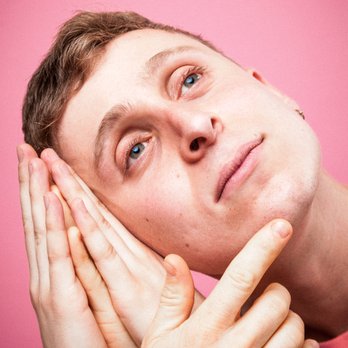 Dylan Hancook Photography - Male comedian with too many hands on pink - Session Photography Near Me - Ann Arbor, Michigan Dylan Hancook Photography - Male comedian with too many hands on pink - Session Photography Near Me - Ann Arbor, Michigan