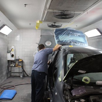 Nigro's Auto Body - Our team working on a vehicle in our shop - Body Shops Near Me - Philadelphia, Pennsylvania Nigro's Auto Body - Our team working on a vehicle in our shop - Body Shops Near Me - Philadelphia, Pennsylvania
