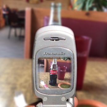 El Herradero - a hand holding a cell phone - New American Near Me - Pocatello, Idaho El Herradero - a hand holding a cell phone - New American Near Me - Pocatello, Idaho