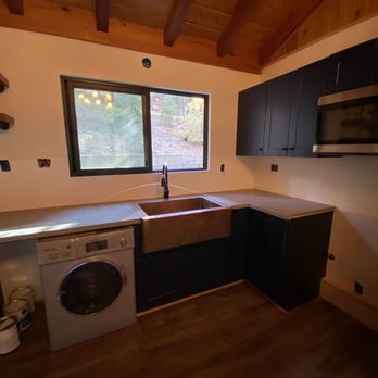 Mountain Hill Construction - a kitchen with a washer and dryer - General Contractors Near Me Mountain Hill Construction - a kitchen with a washer and dryer - General Contractors Near Me