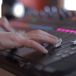 Garnish Music Production School - Hard at work mixing some tracks at the big console
