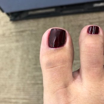 Eagle Nails Salon - Picture of the crooked toe nail.  I also noticed that there is a patch of polish missing?  It looks duller in one area. - Nail Salons Near Me - Kaneohe, Hawaii