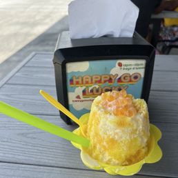 Mango shaved ice with mango puree, sweetened condensed milk, and mango boba Mango shaved ice with mango puree, sweetened condensed milk, and mango boba