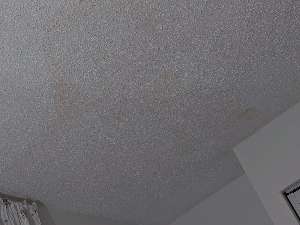 Slide of EZ Roofing of Flagler County