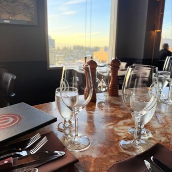 Daniel's Broiler - Bellevue - Cheers to a lovely evening! - Steakhouses Near Me - Bellevue, Washington