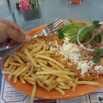 Barnaby's Cafe - Look at this Ginormous Tinga Torta using the fork for scale - Breakfast & Brunch Near Me - Houston, Texas