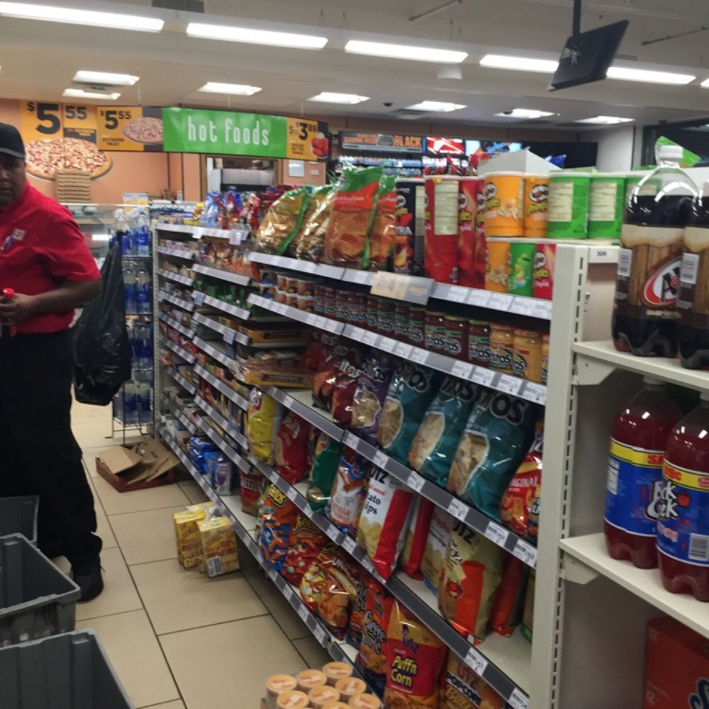 7-Eleven - a man in a grocery store - Convenience Stores Near Me - Alexandria, Virginia