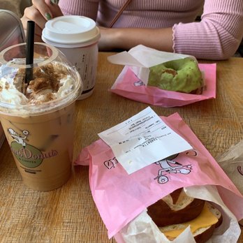 Stan's Donuts & Coffee - Large iced pumpkin spice latte, pretzel stanwich, vanilla latte and pistachio glazed donut in the back - Donuts Near Me - Chicago, Illinois Stan's Donuts & Coffee - Large iced pumpkin spice latte, pretzel stanwich, vanilla latte and pistachio glazed donut in the back - Donuts Near Me - Chicago, Illinois