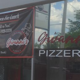 This is the front of the pizzeria This is the front of the pizzeria