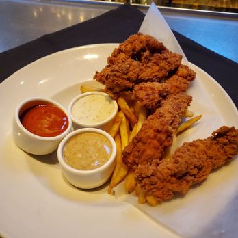 Yard House - Chicken tenders & fries with great sauces, buffalo, ranch, & honey mustard - New American Near Me - Austin, Texas Yard House - Chicken tenders & fries with great sauces, buffalo, ranch, & honey mustard - New American Near Me - Austin, Texas
