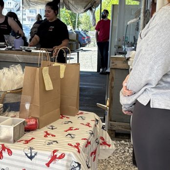 Lobster Landing - He stood off to the side for a few minutes but then was walking around talking to the workers. - Seafood Markets Near Me - Clinton, Connecticut