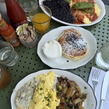 Bubby's Tribeca - Biscuits and Hatch Chili Sausage Gravy Huevos Rancheros Pancake with chocolate chips - American Near Me - New York, New York Bubby's Tribeca - Biscuits and Hatch Chili Sausage Gravy Huevos Rancheros Pancake with chocolate chips - American Near Me - New York, New York