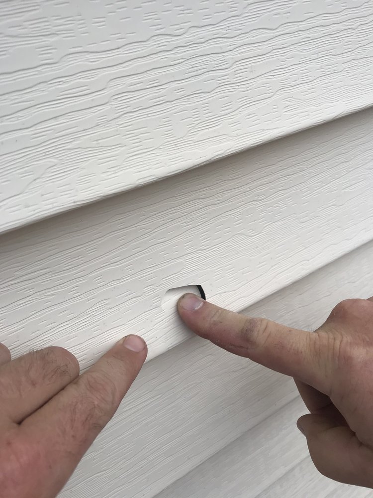 Slide of Advantage Roofing Company