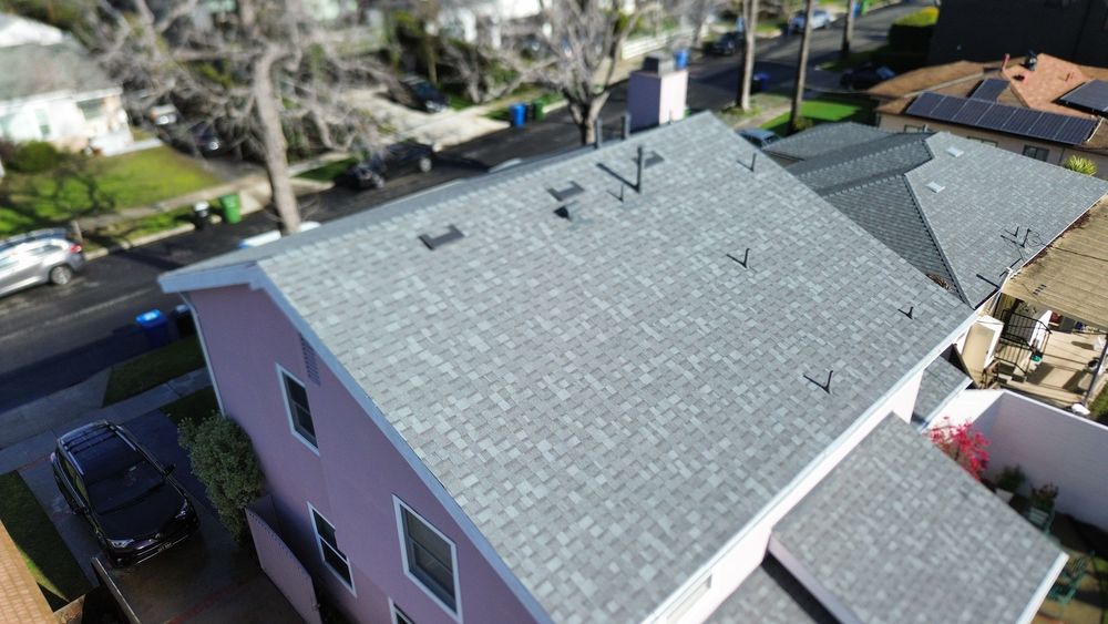 Slide of Pacific Roofers