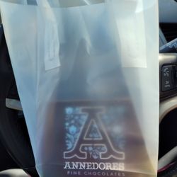 Annedore's Fine Chocolates - Bag of boxed chocolate