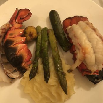Firefly - Broiled Lobster Tail Entree - Steakhouses Near Me - Panama City Beach, Florida Firefly - Broiled Lobster Tail Entree - Steakhouses Near Me - Panama City Beach, Florida