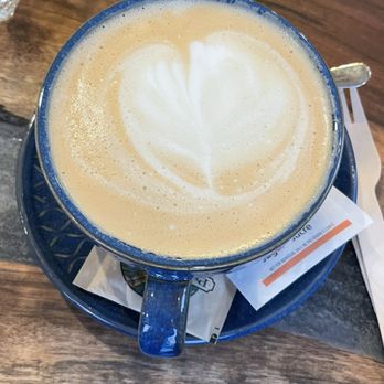 La Prosciutteria - a cup of coffee on a table - Italian Near Me - Edmonton, Alberta La Prosciutteria - a cup of coffee on a table - Italian Near Me - Edmonton, Alberta