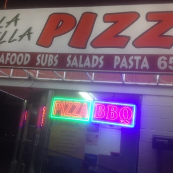 La Bella Pizza - a neon sign for a restaurant - Pizza Near Me - Canyon, Texas La Bella Pizza - a neon sign for a restaurant - Pizza Near Me - Canyon, Texas