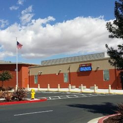 Amador Elementary School - Library and flag pole. Bus / permit parking area