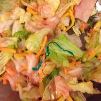 Jet's Pizza - Twist tie in salad - Pizza Near Me - Shelby Township, Michigan