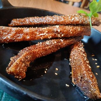 Banzeiro - Glazed seet and sour tambaqui fish ribs to eat with your hands - Seafood Near Me - Itaim Bibi, SP