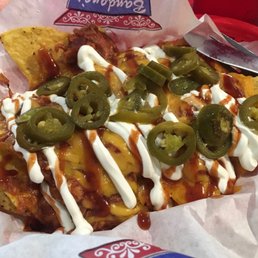 Half order chicken nachos (sauce was SWEET) Half order chicken nachos (sauce was SWEET)