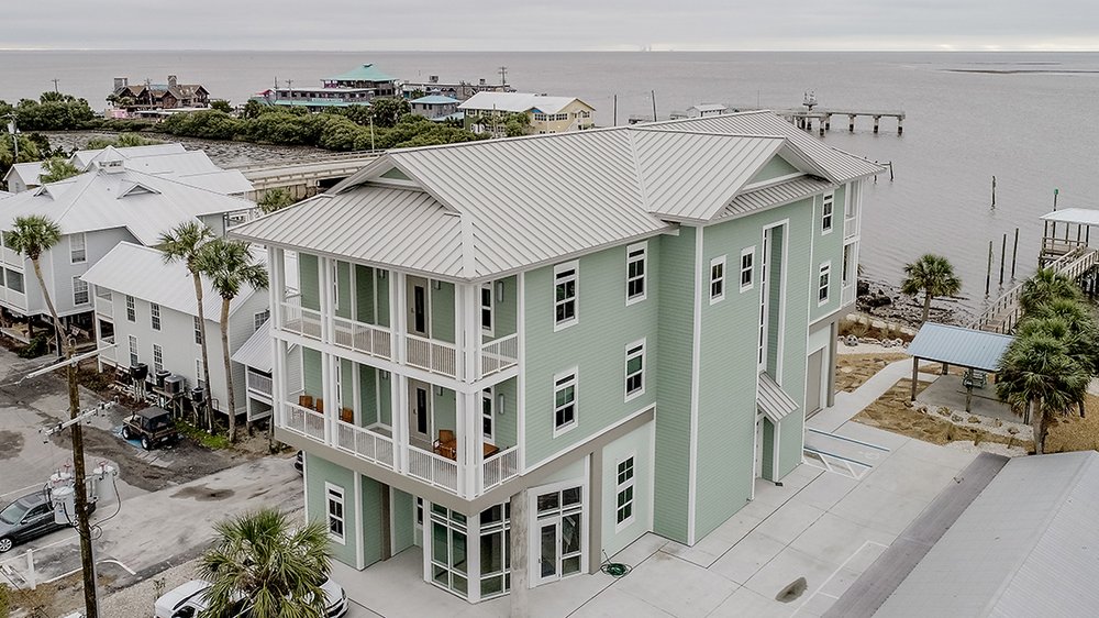Slide of Shark Roofing