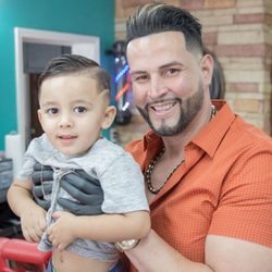 Top of the Line Barber Cutz - Frankie with one of his customers