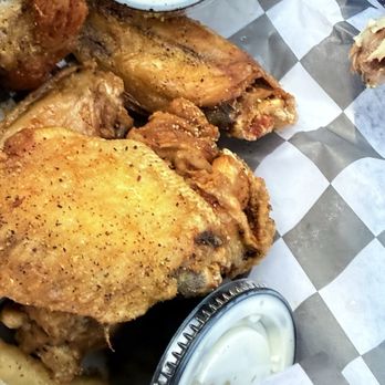 The Surfyard - Lemon pepper chicken wings with a side of ranch dressing. - Seafood Near Me - Corpus Christi, Texas The Surfyard - Lemon pepper chicken wings with a side of ranch dressing. - Seafood Near Me - Corpus Christi, Texas
