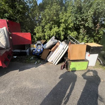 Junk King St. Paul - Before picture of a pile of junk left by a dumpster at an apartment complex. - Junk Removal & Hauling Near Me - Roseville, Minnesota Junk King St. Paul - Before picture of a pile of junk left by a dumpster at an apartment complex. - Junk Removal & Hauling Near Me - Roseville, Minnesota