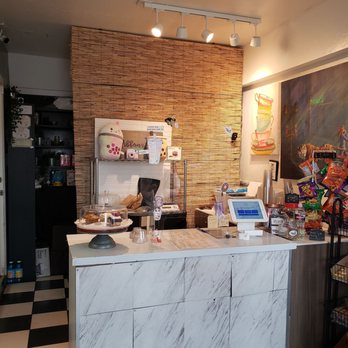Ribbons Tea House - a kitchen with a checkered floor - Tea Rooms Near Me - Litchfield Park, Arizona