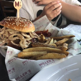 Miller's Ale House - Lancaster - Cue bacon cheeseburger was a hit with the kiddo. Tangy BBQ and crunchy onion tanglers. - Sports Bars Near Me - Lancaster, Pennsylvania Miller's Ale House - Lancaster - Cue bacon cheeseburger was a hit with the kiddo. Tangy BBQ and crunchy onion tanglers. - Sports Bars Near Me - Lancaster, Pennsylvania