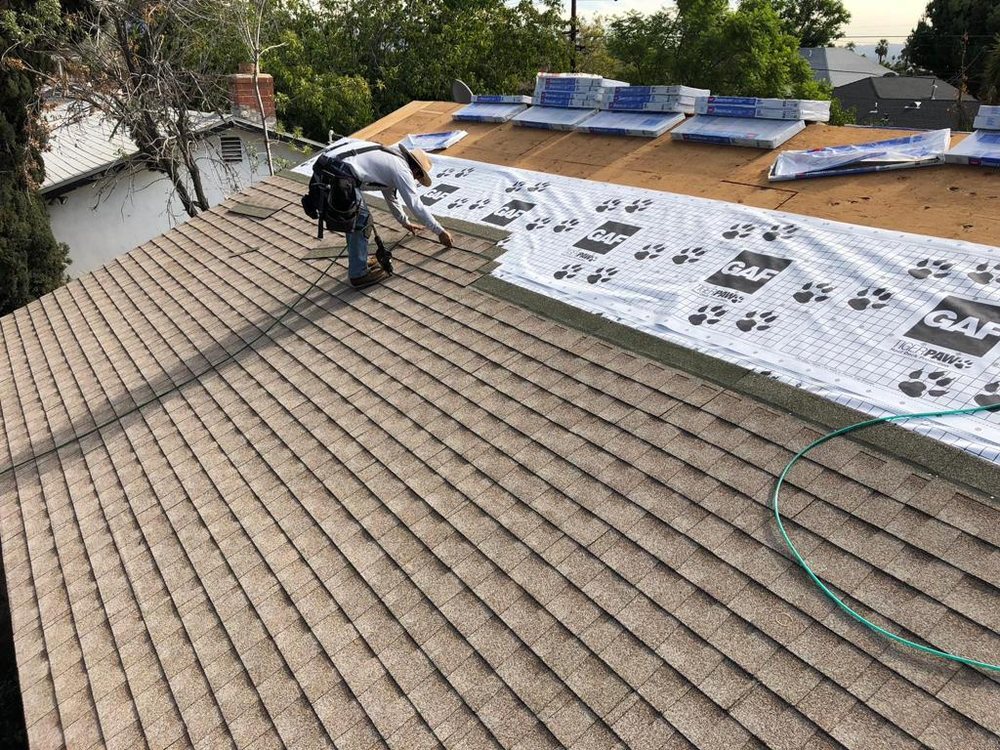 Slide of Top Roofing Inc