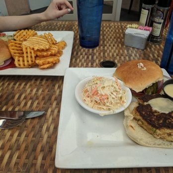 Hobo's Cafe - Crab cake sandwich and Cole slaw. Fish sandwich (poorly viewed sorry!) and waffle fries - New American Near Me - Key Largo, Florida
